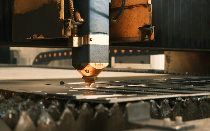 Photo by Cemrecan Yurtman: https://www.pexels.com/photo/modern-laser-cutter-in-industrial-environment-29988967/